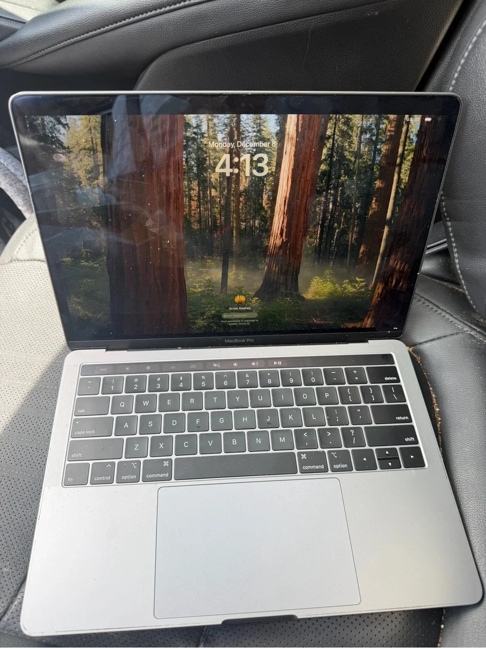 Apple Silver MacBook Laptop with Apple Logo
